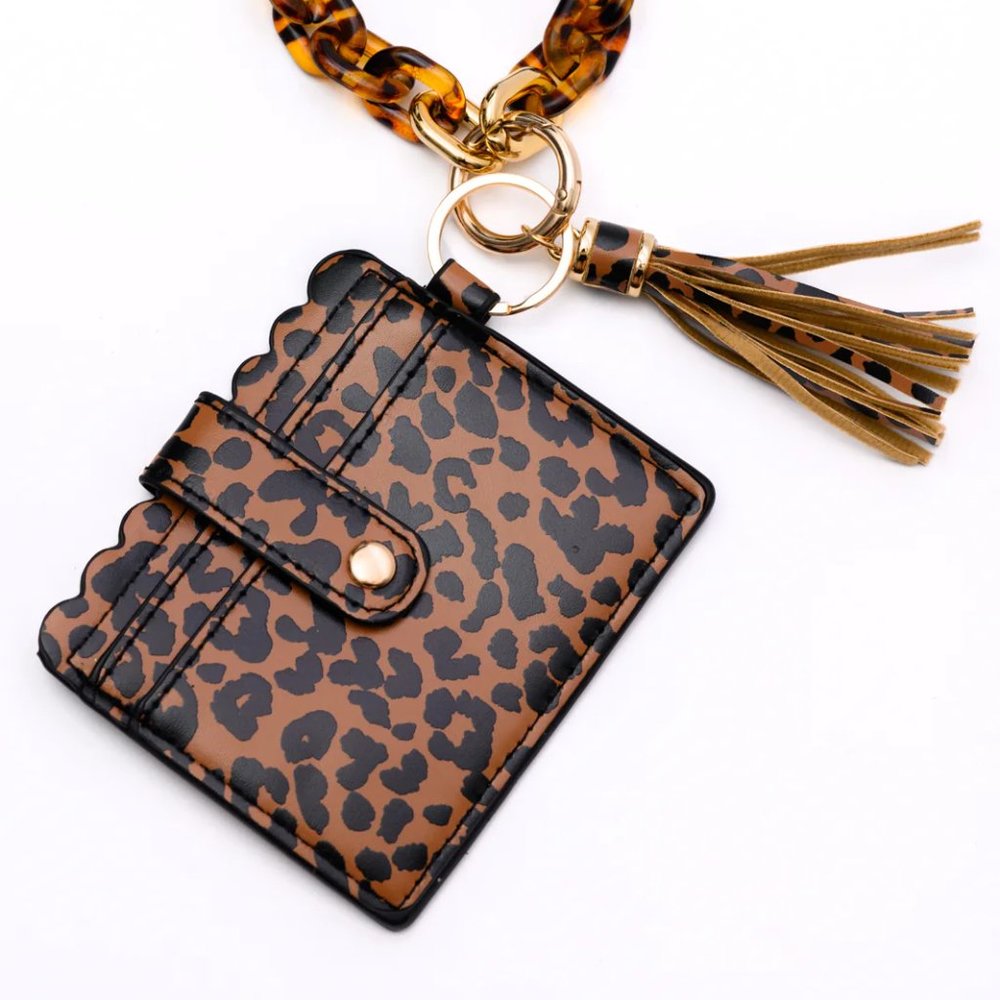 HOLD ONTO YOU WRISTLET WALLET IN LEOPARD